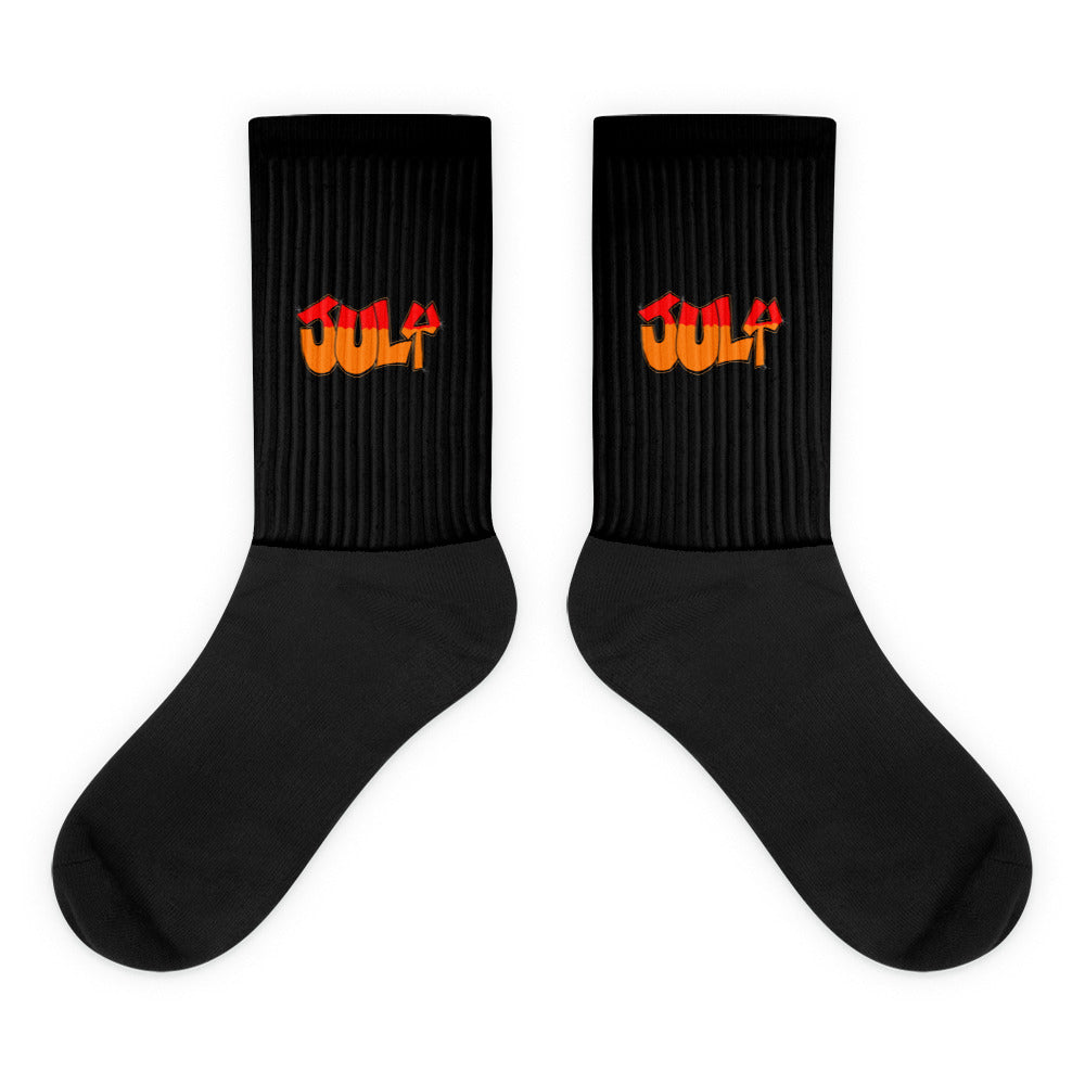 VKM Illustrations july graffiti art print on a black crew sock with a cushioned sole.