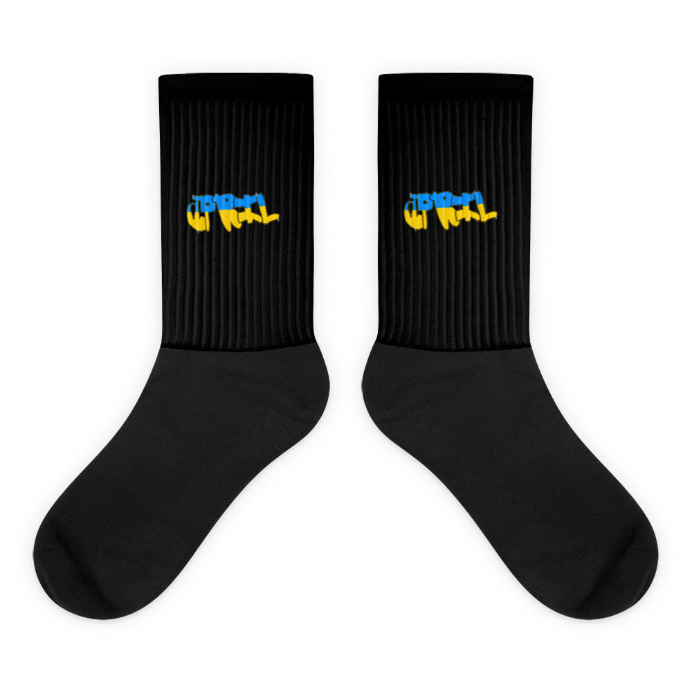 VKM Illustrations april graffiti art print on a black crew sock with a cushioned sole.