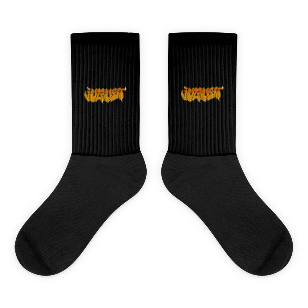 VKM Illustrations august graffiti art print on a black crew sock with a cushioned sole.