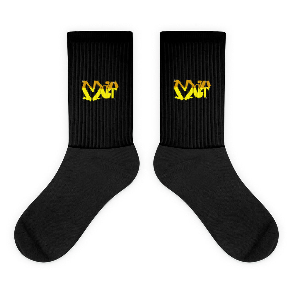 VKM Illustrations may graffiti art print on a black crew sock with a cushioned sole.