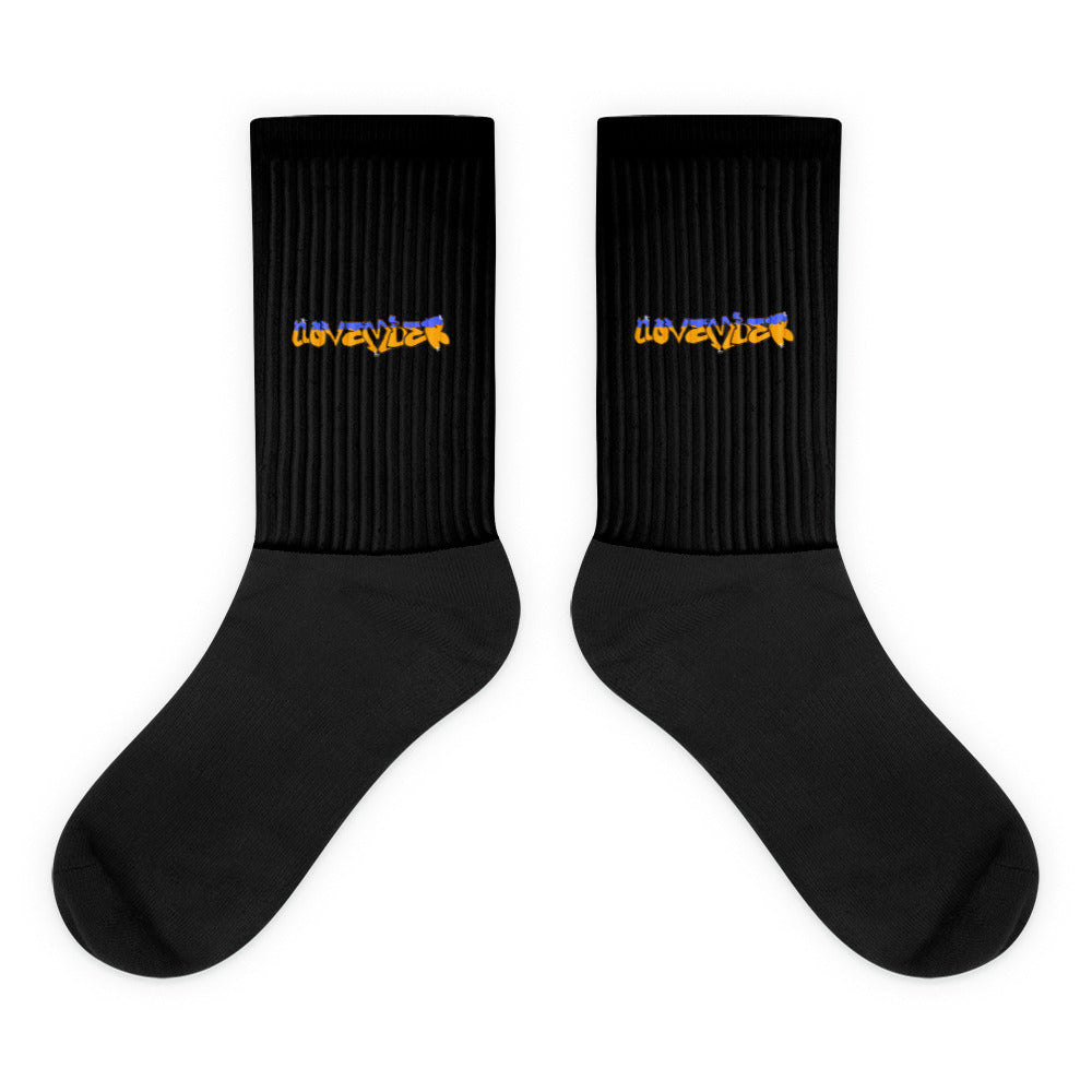 VKM Illustrations november graffiti art print on a black crew sock with a cushioned sole.