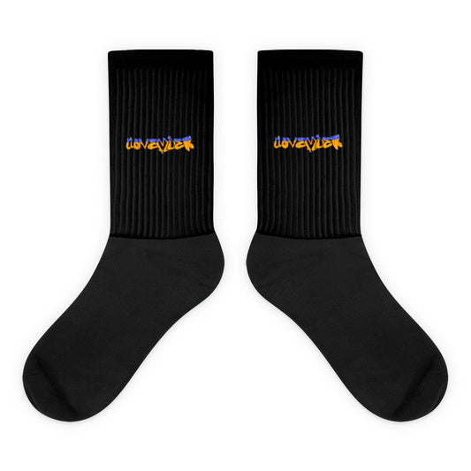 VKM Illustrations november graffiti art print on a black crew sock with a cushioned sole.