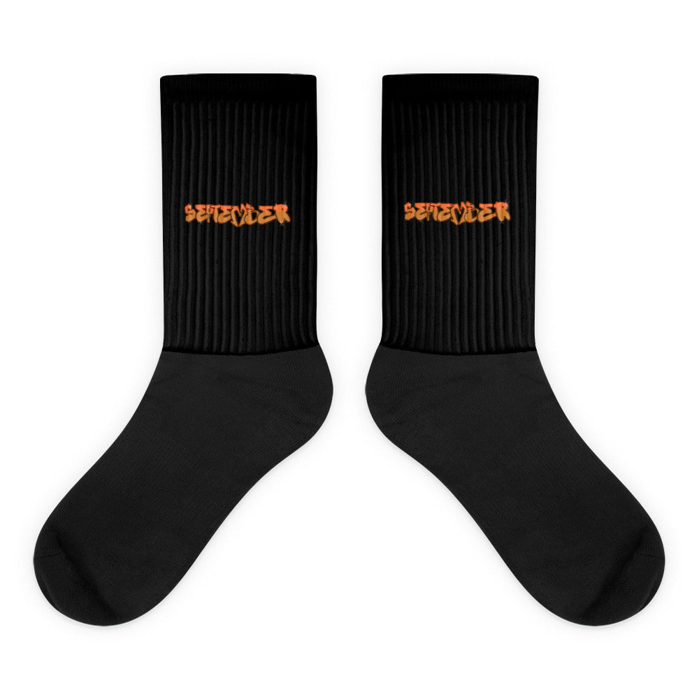 VKM Illustrations september graffiti art print on a black crew sock with a cushioned sole.